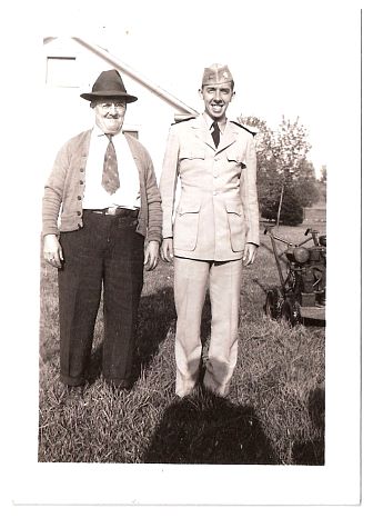 1944.. - Wilfred, Ensign Robert - on leave - with Whirlwind mower.jpg